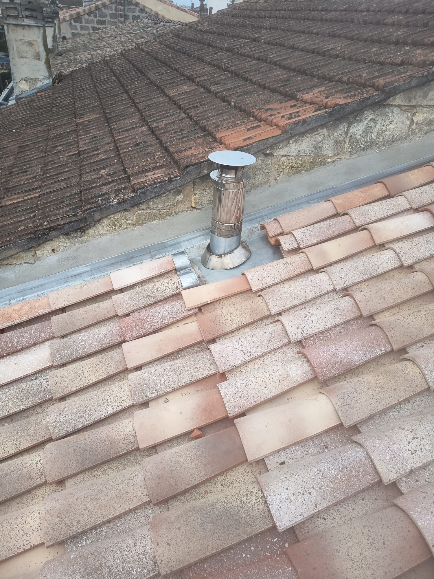 Artisan charpentier finitions toit plat